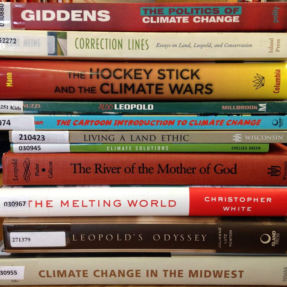 A stack of books about climate change
