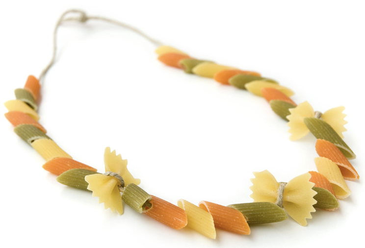 A necklace made of uncooked multicolored ziti and bowtie pasta